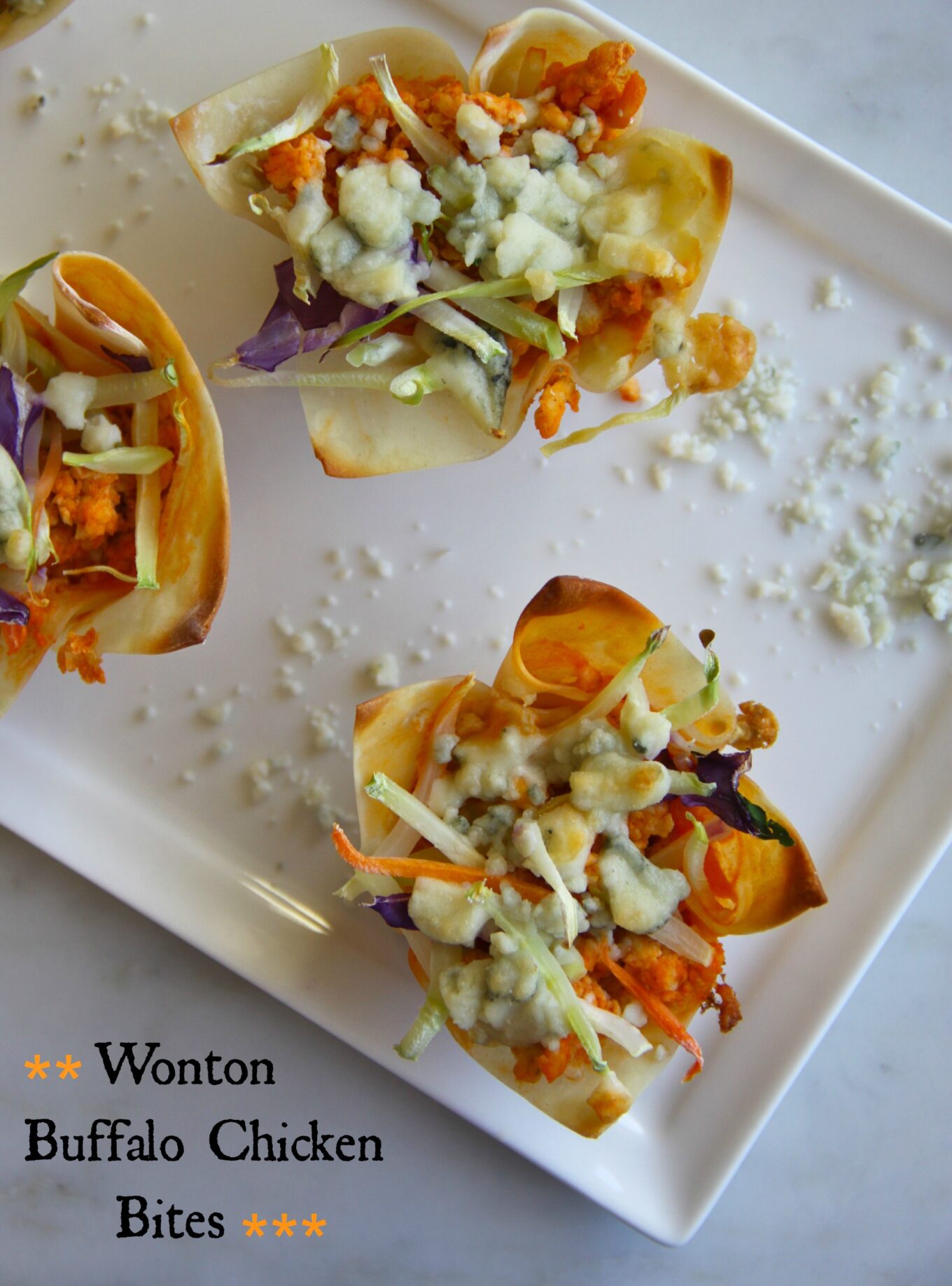 foodie fridays: wonton game-day buffalo chicken bites - The Curious Plate