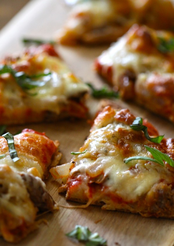 pot roast naan pizza with caramelized onions and fontina cheese