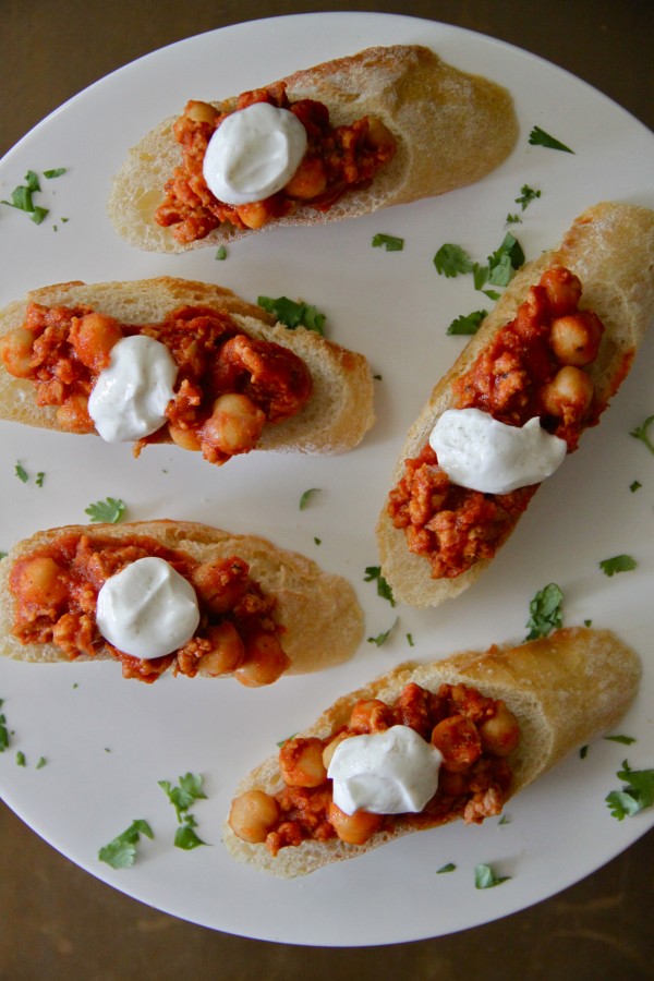 chicken chorizo and chickpea crostini with spiced greek yogurt www.climbinggriermountain.com