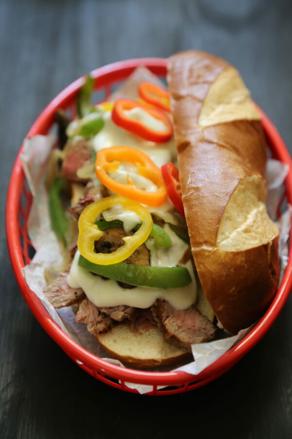 philly cheesesteaks with sweet peppers and homemade provolone sauce www.climbinggriermountain.com