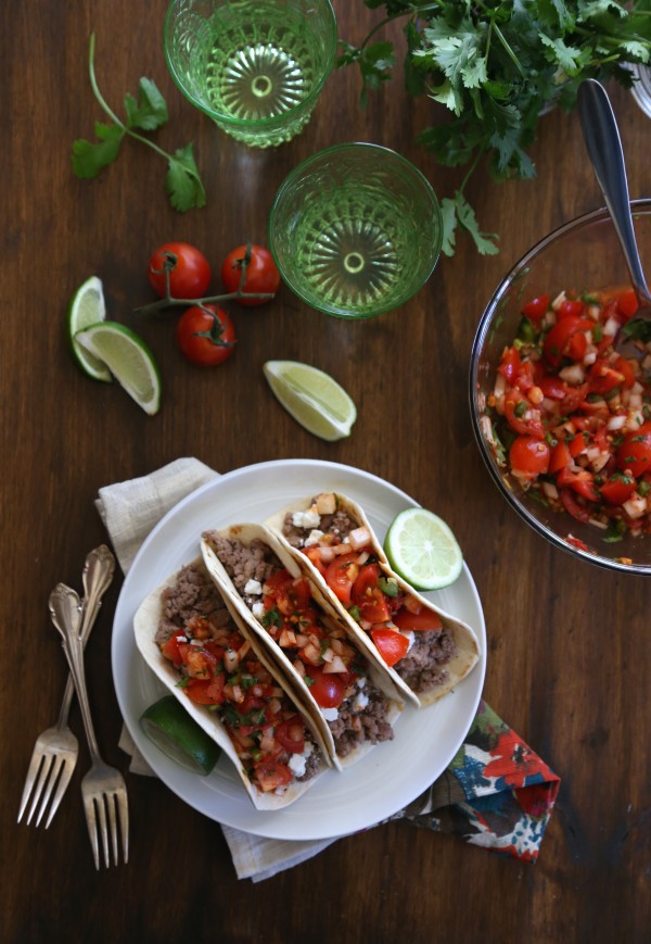 spicy lamb tacos with harissa pico de gallo three