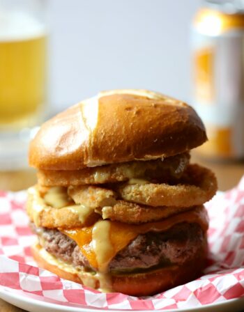 juicy ball park burger with onion rings & mustard beer sauce www.climbinbggriermountain.com
