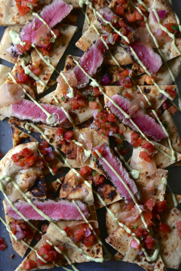 seared sesame ahi tuna naan nachos with avocado wasabi cream & pickled ginger www.climbinggriermountain.com