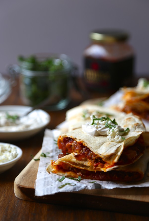 Spicy Harissa Quesadilla with Lamb, Caramelized Onions, and Cojita-Feta Cheese three