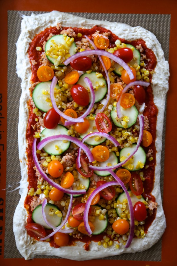 farmer’s market thin crust pizza with burrata & chicken sausage