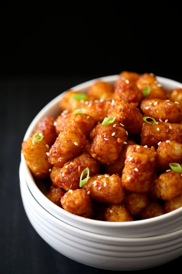 asian barbecue sticky tater tots with toasted sesame seeds