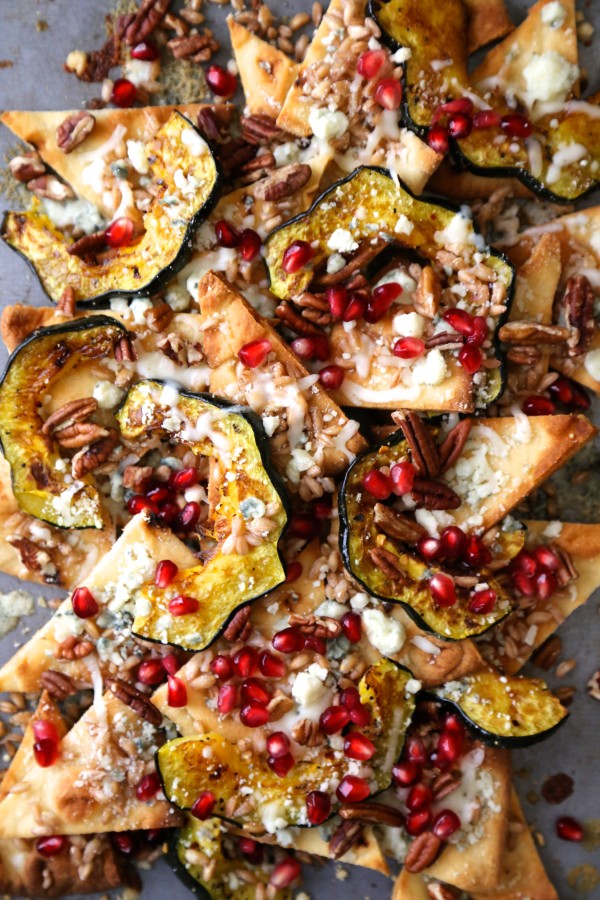 autumn acorn squash pita "nachos" with pomegranates & blue cheese