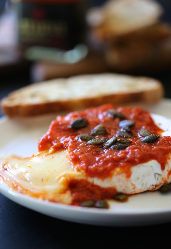 baked brie with harissa & moroccan spiced pepitas