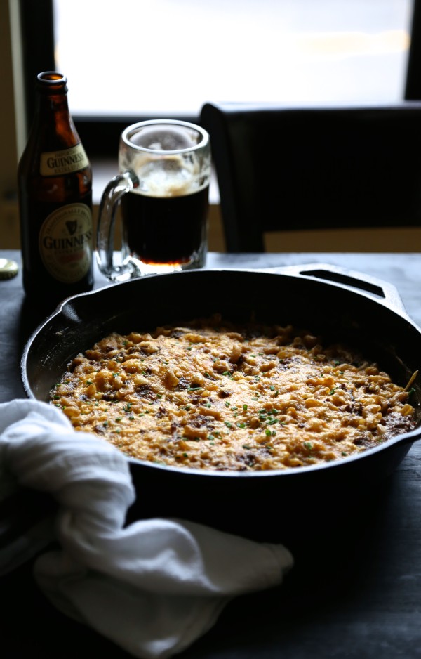 Guinness mac and cheese with beef in a skillet.