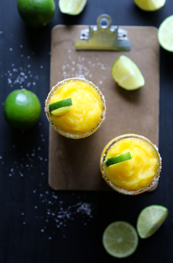 Overhead view of mango-ginger bourbon slush cocktail.