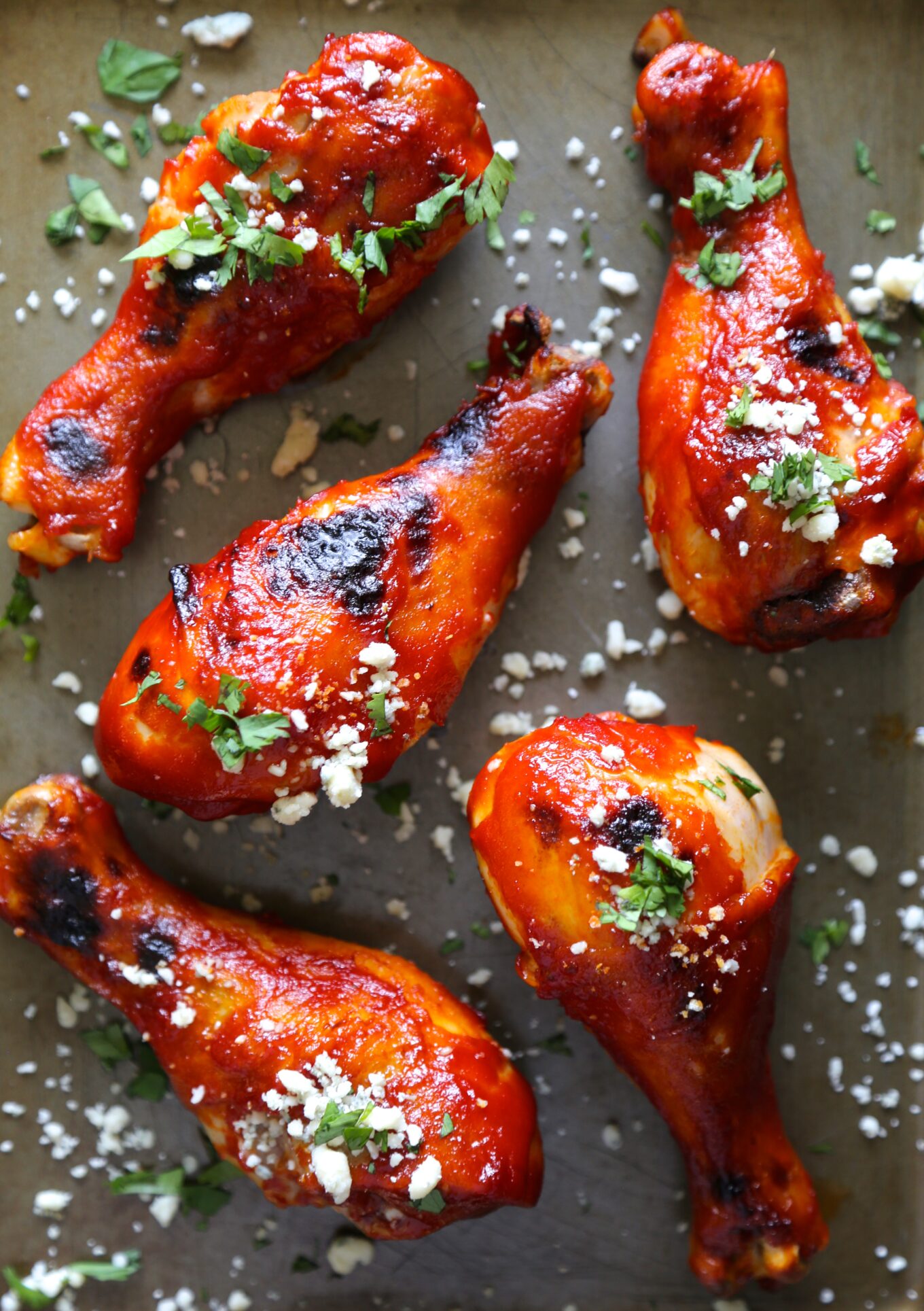 baked buffalo spicy chicken drumsticks with blue cheese - The Curious