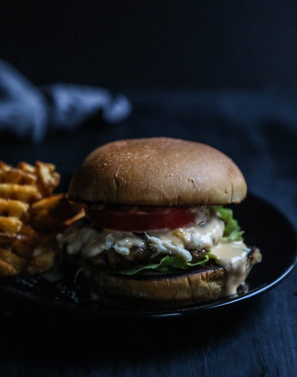 Crab Topped Cajun Burger with Pimento Cheese Gravy www.climbinggriermountain.com II