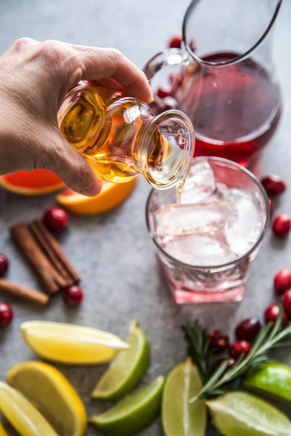 whiskey being poured into a glass