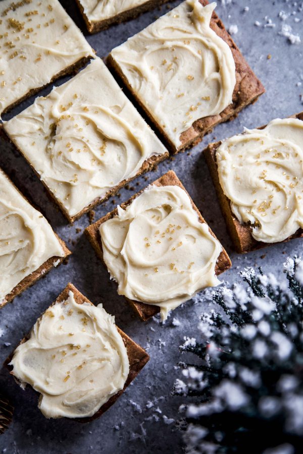 Gingerbread Cookie Bars with Caramel Frosting on a table