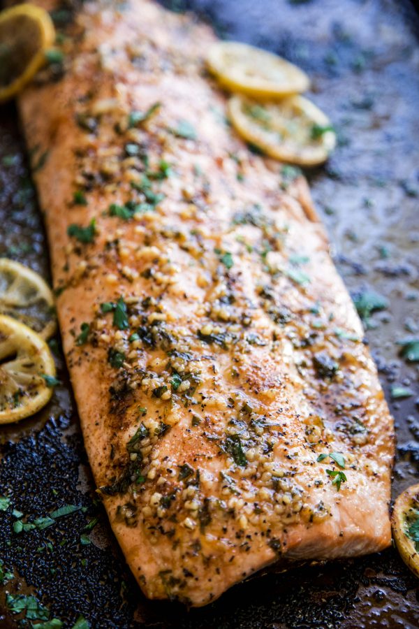 Baked Cajun Parmesan Salmon on a sheet pan.