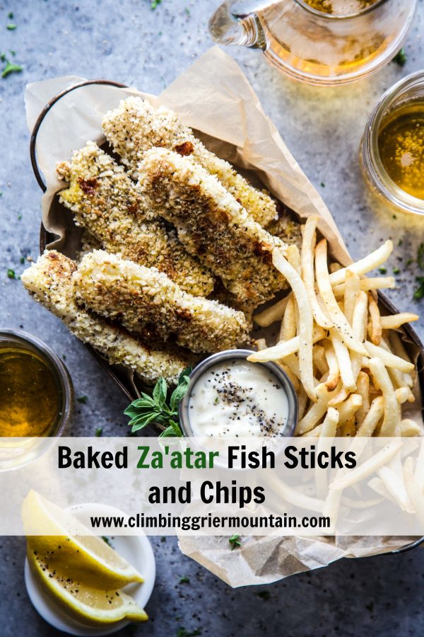 Baked Za'atar Fish Sticks and Chips on a table