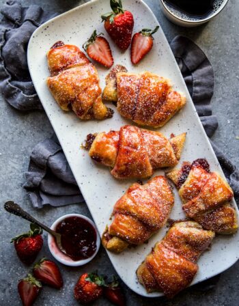 Easy Strawberry and Cardamom Croissants on a serving tray