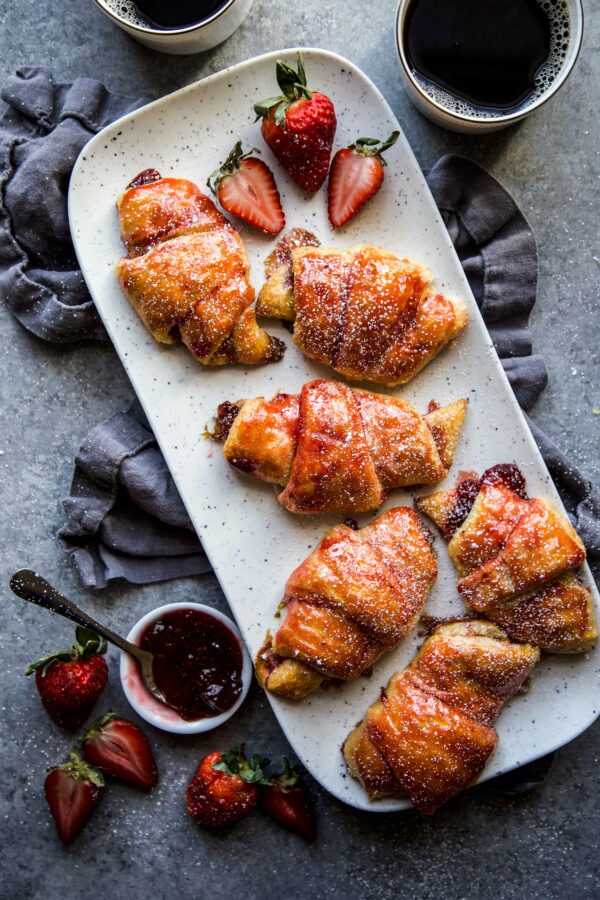 Easy Strawberry and Cardamom Croissants on a serving platter