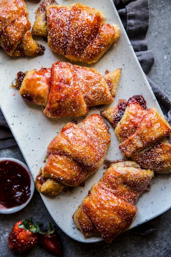 Easy Strawberry and Cardamom Croissants on a serving tray