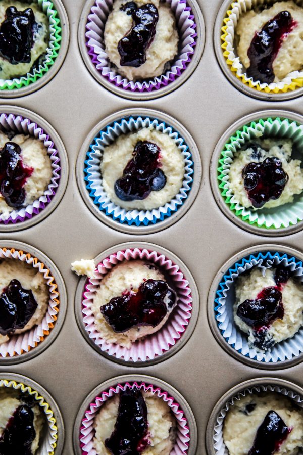 blueberry muffin batter in cupcake liners