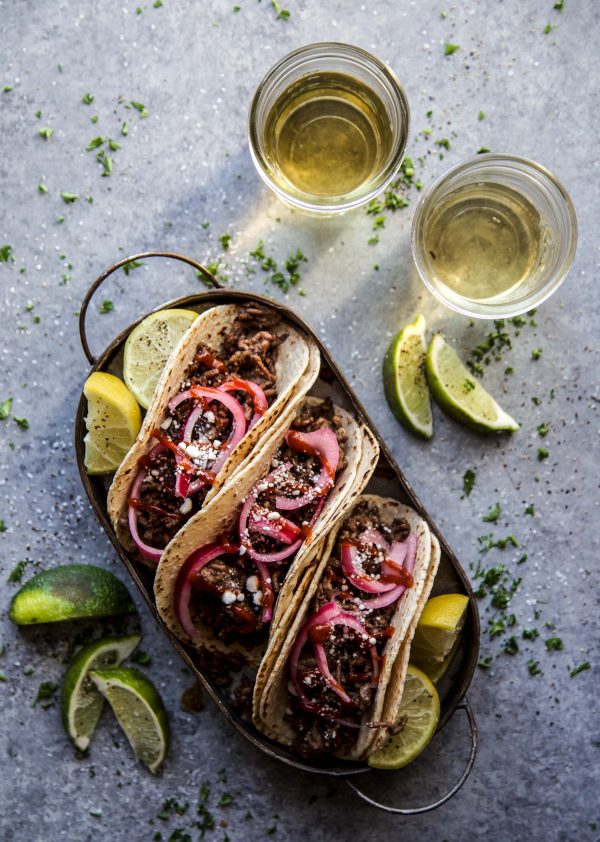 Sesame Beef Tacos with Quick Pickled Onions on a plate