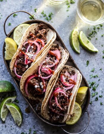 Sesame Beef Tacos with Quick Pickled Onions on a plate