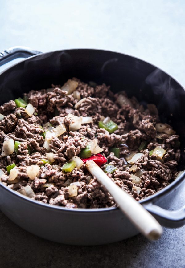 ground beef, green pepper, and onion in a skillet