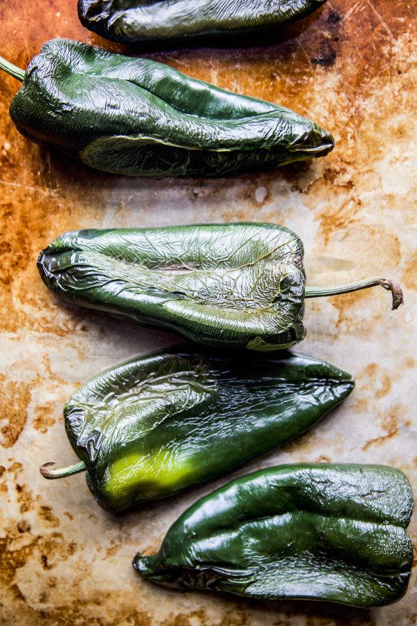 poblano chiles on a baking sheet