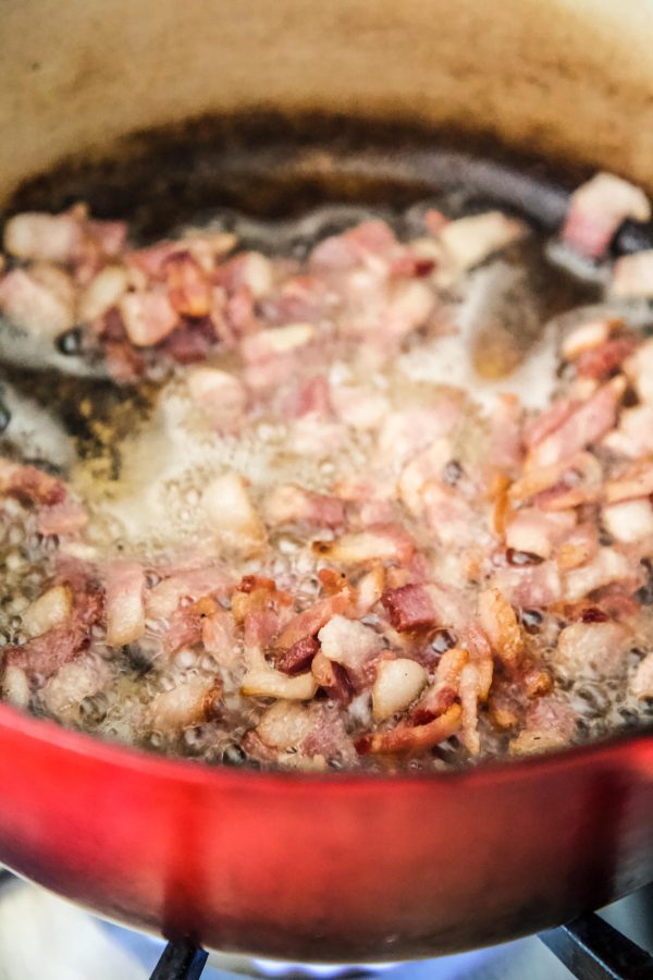 bacon sizzling in a skillet