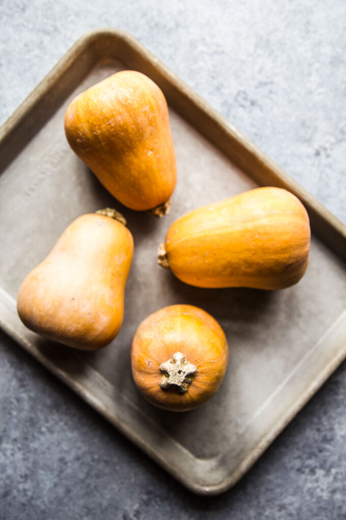 honeynut squash on a baking sheet