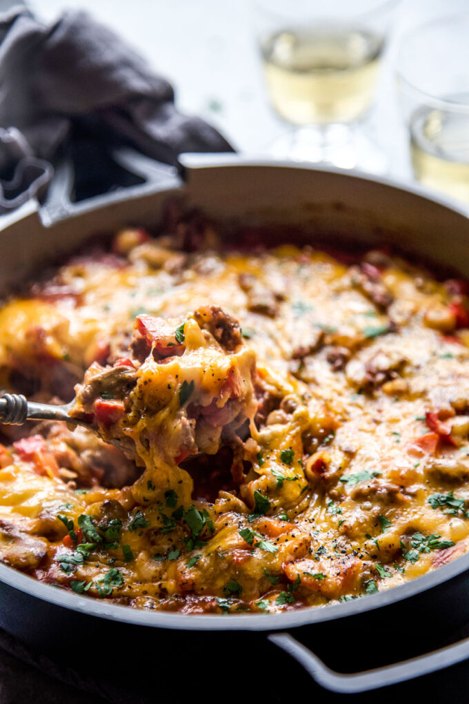 Spoonful of cheesy turkey sloppy joe casserole.