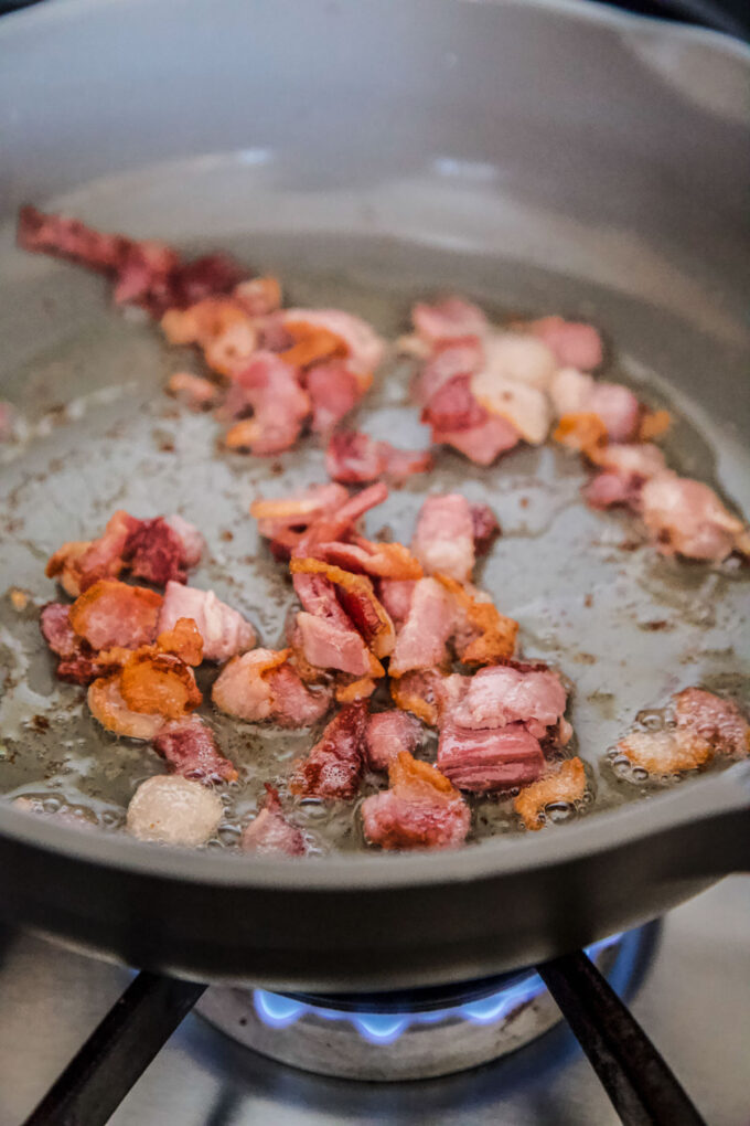 bacon cooking in a skillet