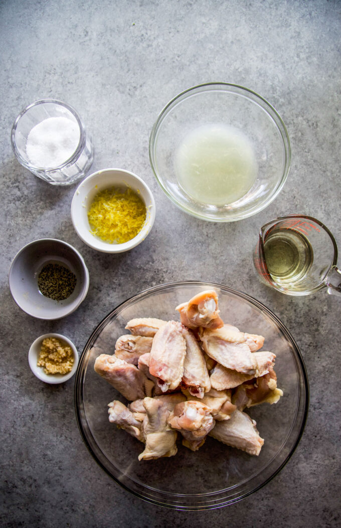 ingredients used to make Lemon Garlic Grilled Chicken Wings with Shishito Peppers - garlic, lemon juice, lemon zest, chicken wings, 
