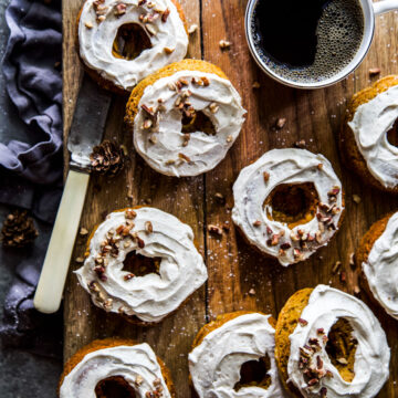 Baked Pumpkin Doughnuts with Maple Frosting www.thecuriousplate.com