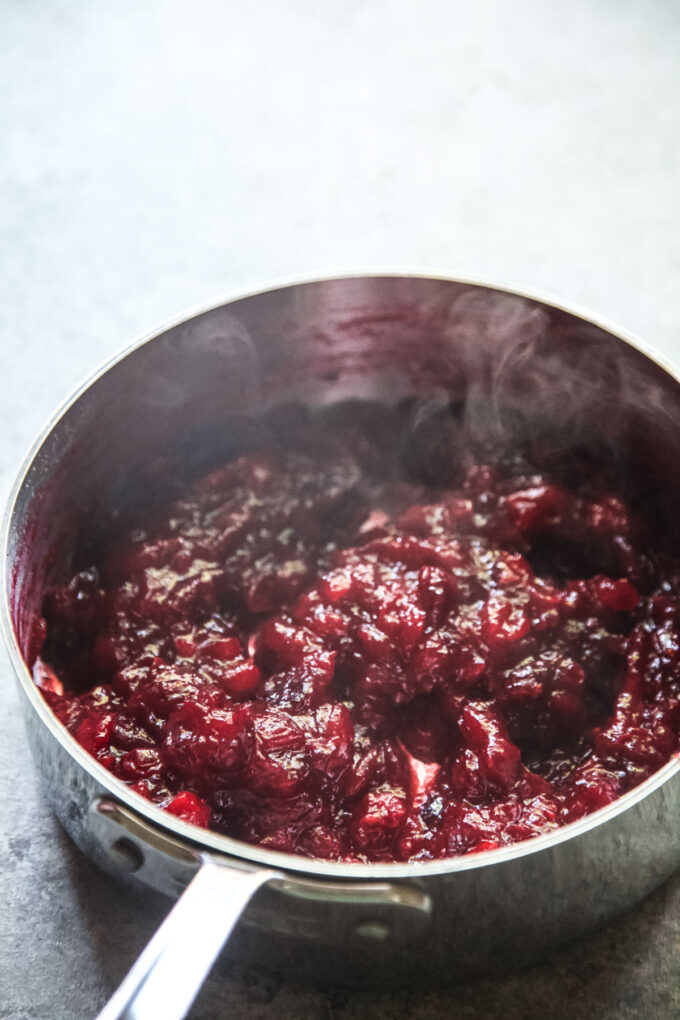 cooling cranberry sauce in a skillet
