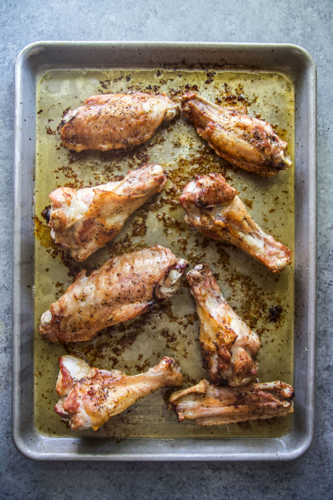 cooked turkey wings on a sheet pan