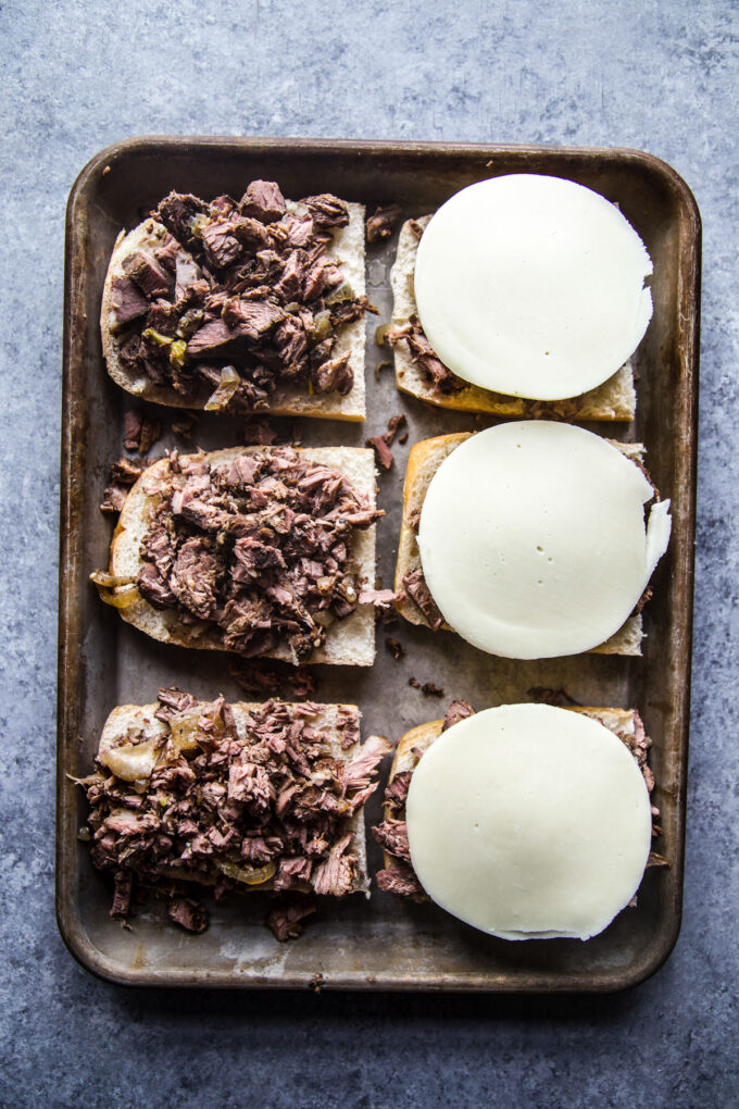 slow cooker shredded pot roast sandwiches with cheese 