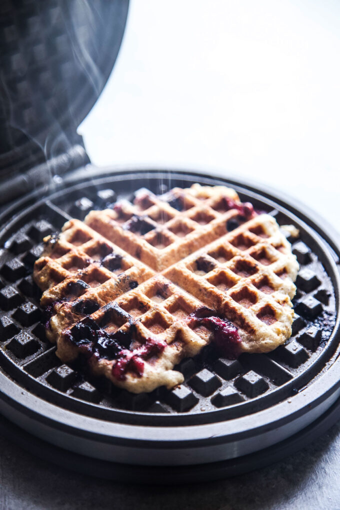 waffle cooking in waffle iron