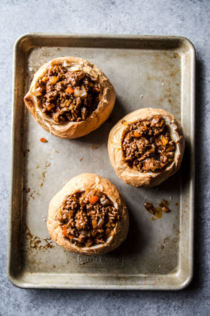 bread bowls filled with sloppy joe mixture
