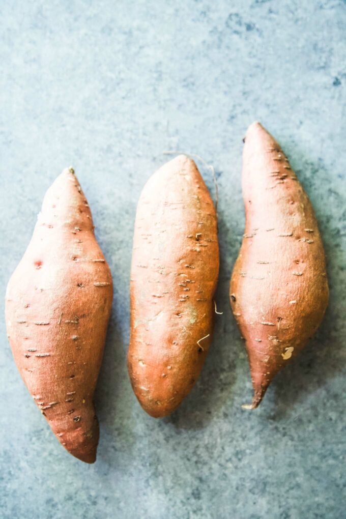 sweet potatoes on a board