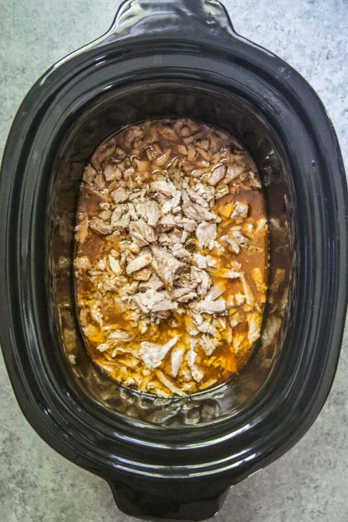 shredded bbq in a slow cooker