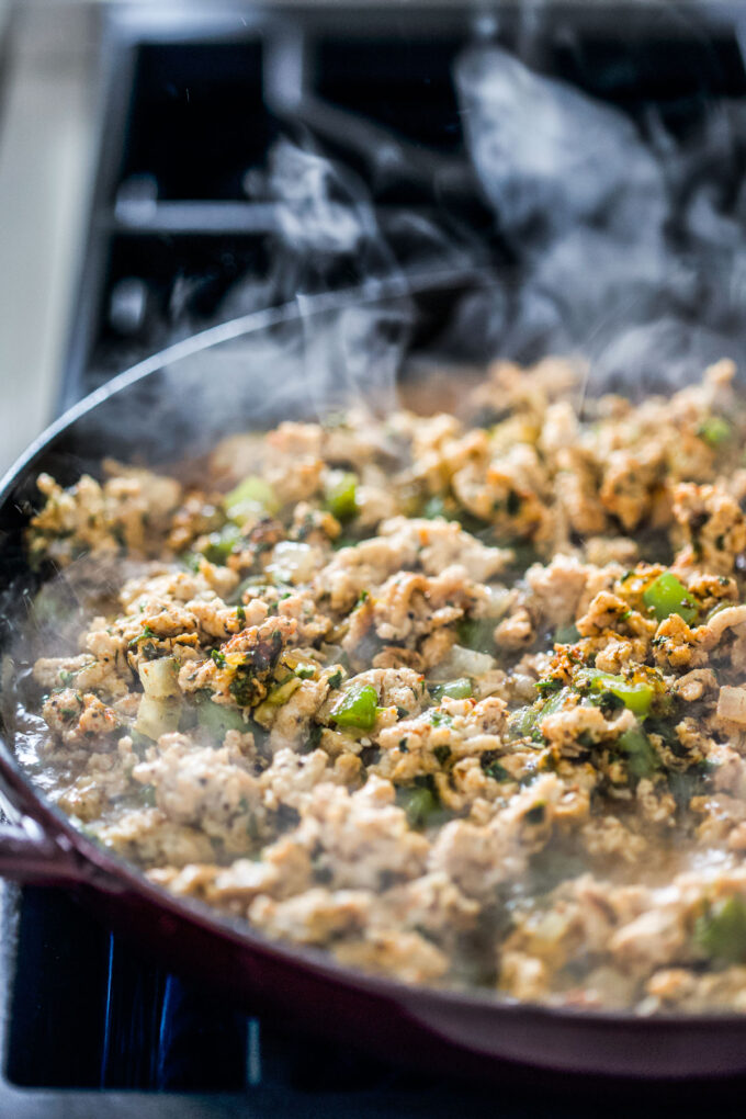 ground chicken cooking in skillet