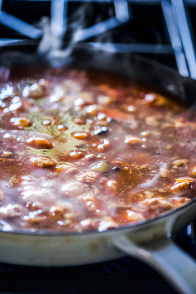 chipotle chicken cooking in a sauce